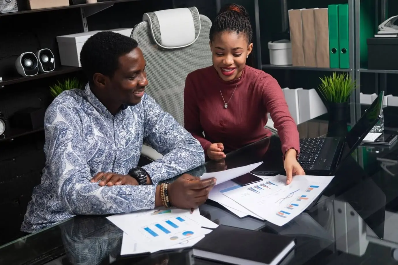 African professionals reviewing field evidence and verification reports
